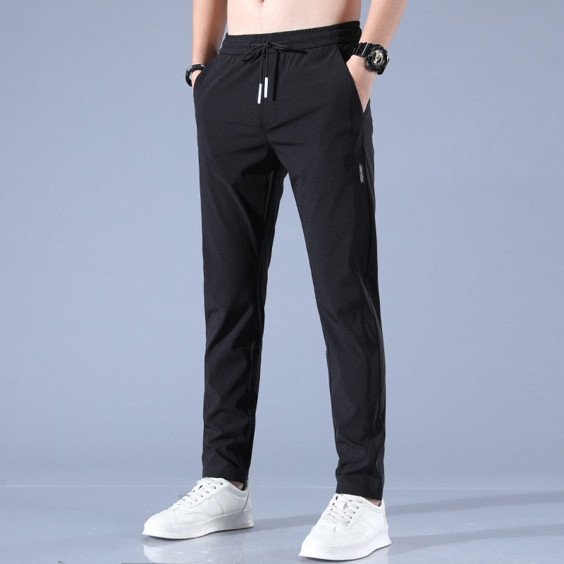 Pantalon Jogging Homme Slim Fit Élastique avec Poches Pratiques en Tissu Respirant - Confort Optimal pour Activités Quotidiennes 0