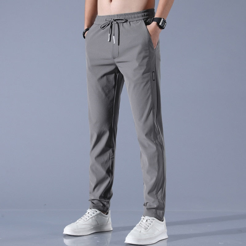 Pantalon Jogging Homme Slim Fit Élastique avec Poches Pratiques en Tissu Respirant - Confort Optimal pour Activités Quotidiennes 1