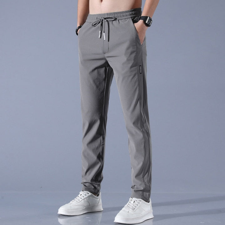 Pantalon Jogging Homme Slim Fit Élastique avec Poches Pratiques en Tissu Respirant - Confort Optimal pour Activités Quotidiennes 1
