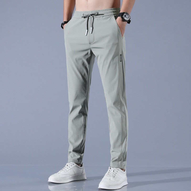 Pantalon Jogging Homme Slim Fit Élastique avec Poches Pratiques en Tissu Respirant - Confort Optimal pour Activités Quotidiennes 2