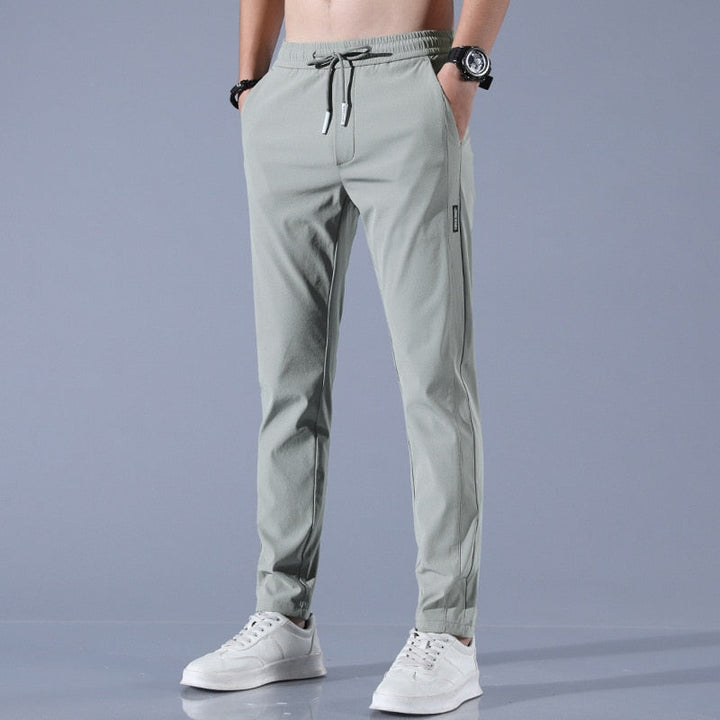 Pantalon Jogging Homme Slim Fit Élastique avec Poches Pratiques en Tissu Respirant - Confort Optimal pour Activités Quotidiennes 2