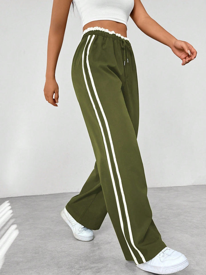Pantalon Sportif Femme Large avec Taille Élastique et Rayures Latérales – Confort et Style Décontracté 7
