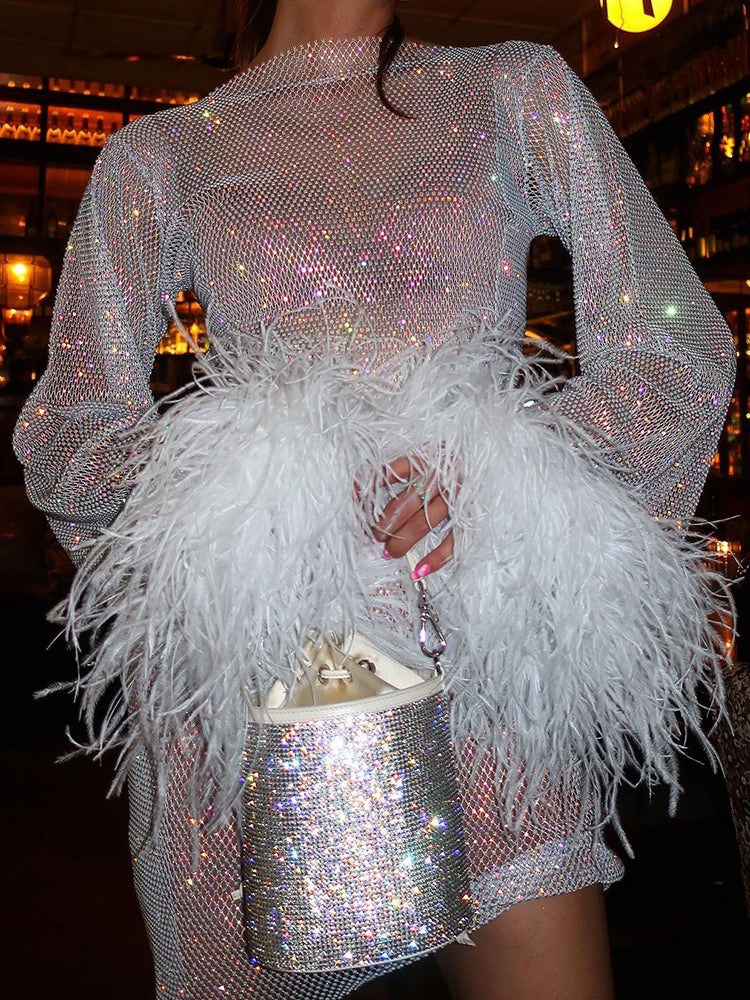 Robe de fête transparente avec manches en tulle et plumes – Élégance et confort 3
