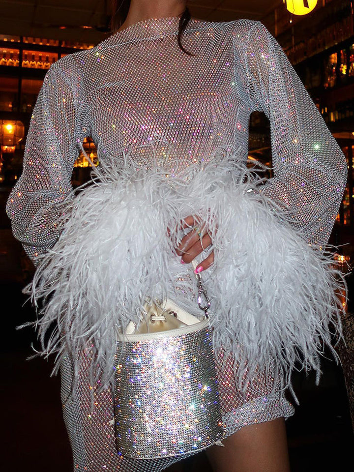 Robe de fête transparente avec manches en tulle et plumes – Élégance et confort 3