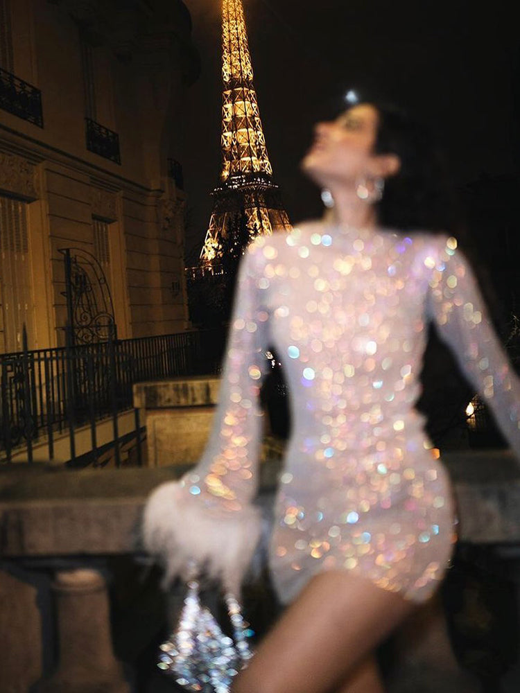 Robe de fête transparente avec manches en tulle et plumes – Élégance et confort 8