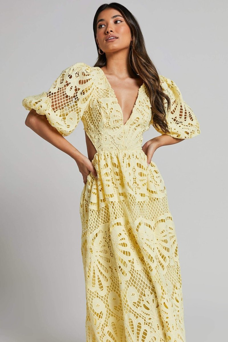 Robe en Dentelle Élégante avec Manches Bouffantes et Décolleté en V – Idéale pour les Occasions Spéciales 1